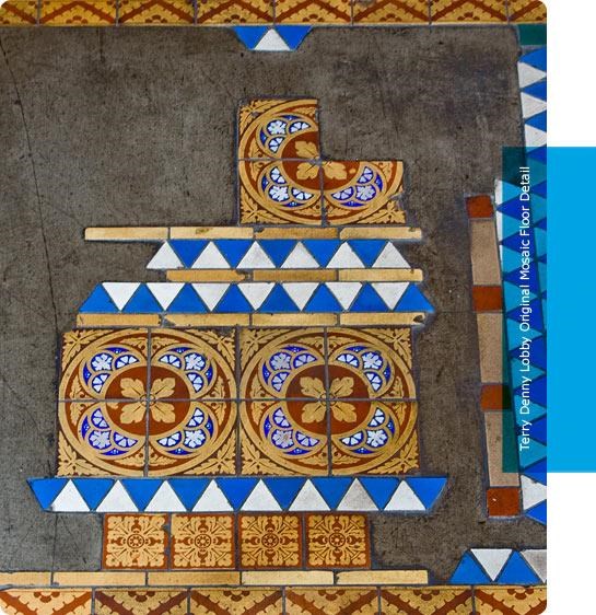 a mosaic of a church with a blue and gold design on the floor