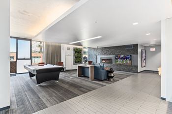 the preserve at ballantyne commons community room with pool table and tv at One 333, Chicago, Illinois