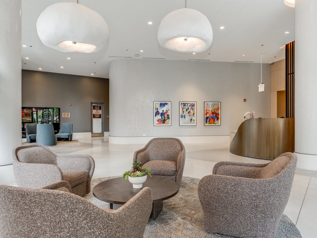 the lobby of a hotel with chairs and a table  at Cassidy on Canal, Chicago, 60606