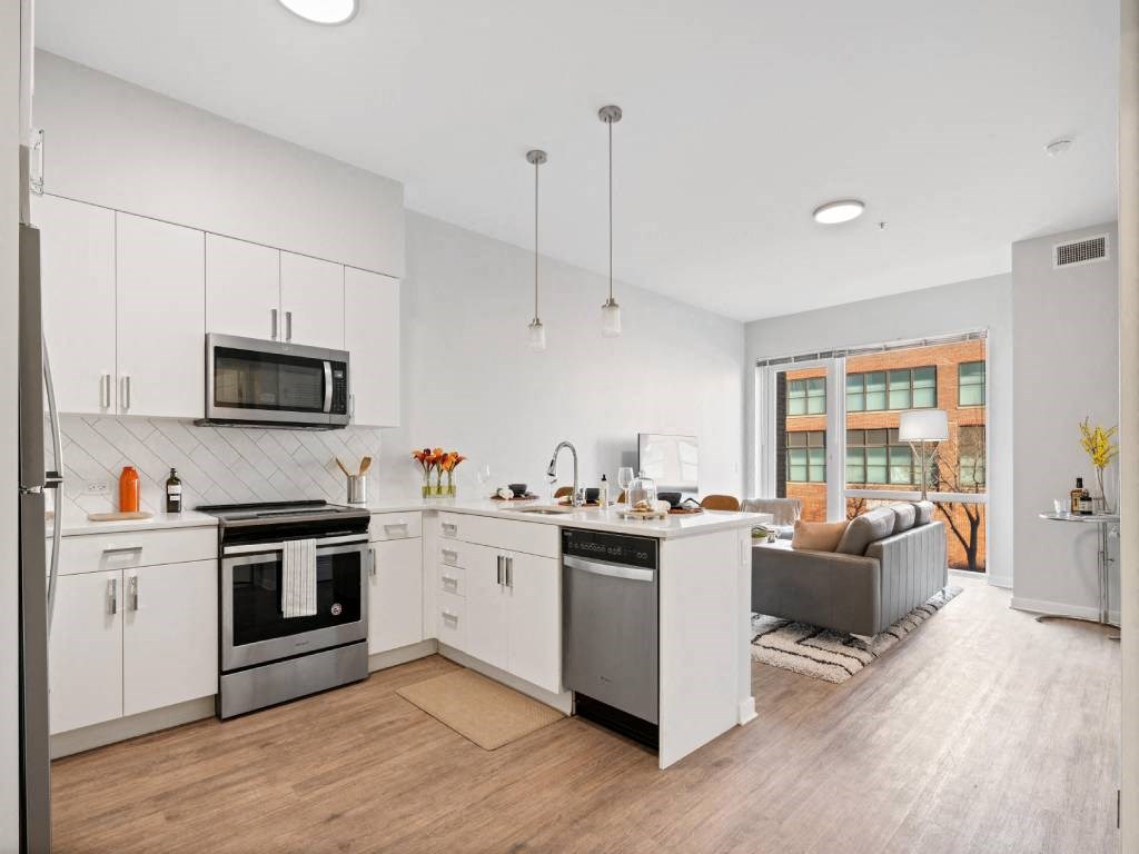 Kitchen With Living Area View at 23rd Place Apartment, Chicago