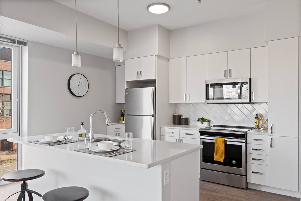 Gourmet Kitchen With Island at 23rd Place Apartments, Chicago, IL