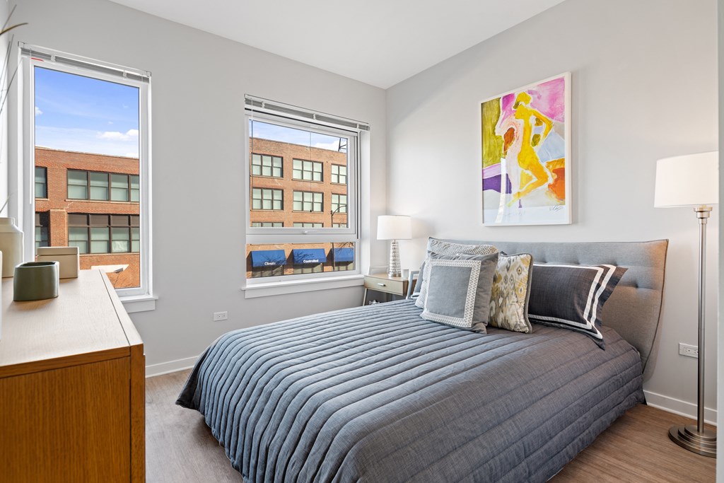 Bedroom With Expansive Windows at 23rd Place Apartments, Chicago, 60616