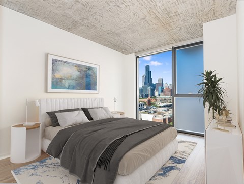 a bedroom with a bed and a large window at One 333, Chicago, Illinois