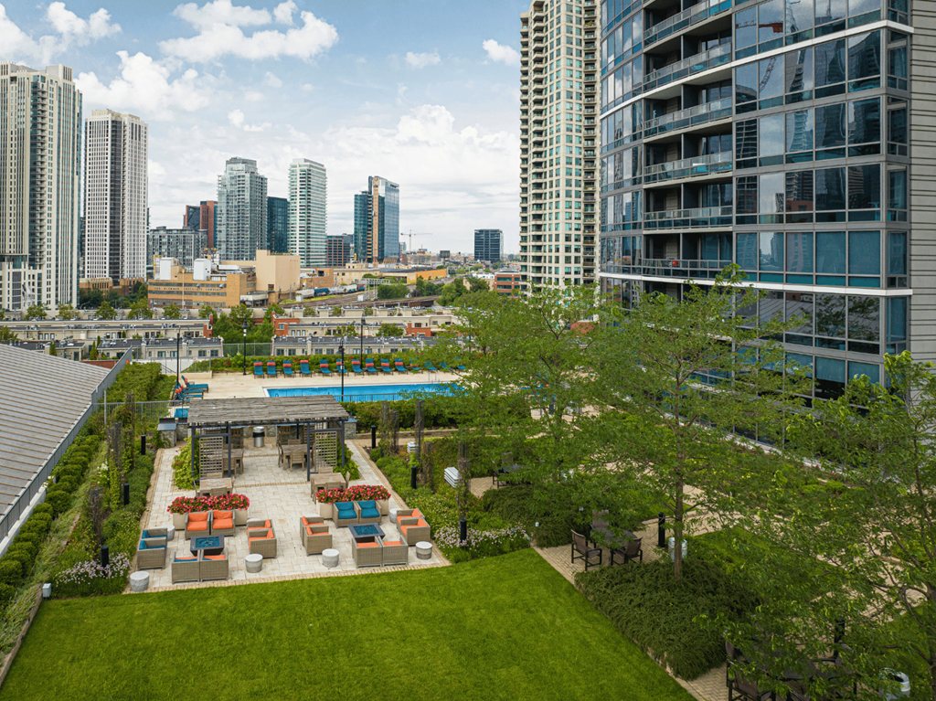Outdoor elevated dining, garden and pool area at Kingsbury Plaza, Illinois, 60654