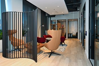 a lobby with a seating area and a gate  at Cassidy on Canal, Chicago