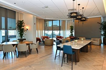 a large dining room with tables and chairs and large windows  at Cassidy on Canal, Chicago, IL