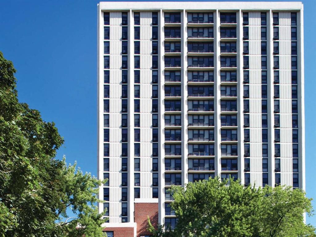 Eden Commons Facade image of 21 Story High Rise Building and two 5 Story Midrise Buildings at Eden Commons, Chicago, Illinois