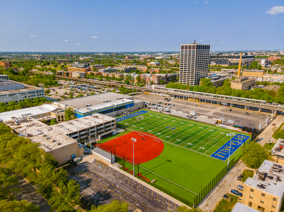 a view of the football field from the top of a building