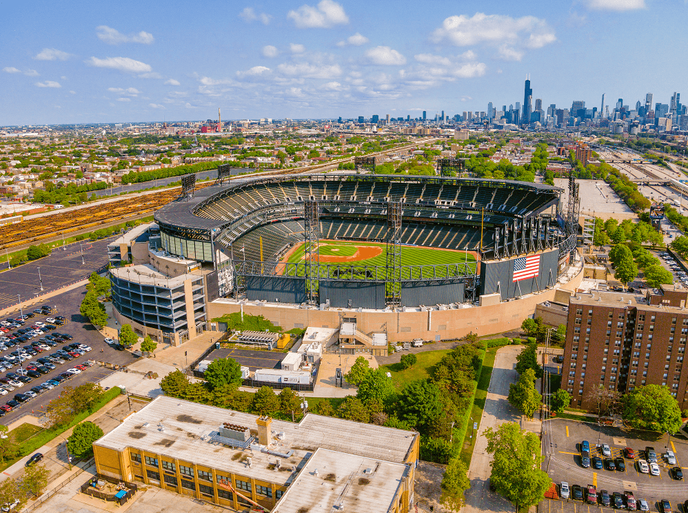 an aerial view of fenway park with the chicago skyline in the background