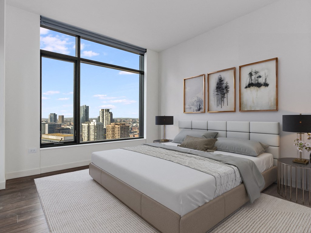 a white bedroom with a large window and a white bed at Cassidy on Canal, Chicago, Illinois