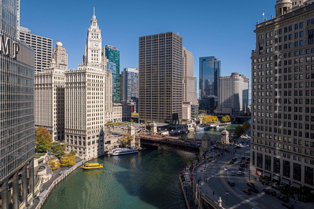 a view of the river in a city with tall buildingsat Columbus Plaza, Chicago