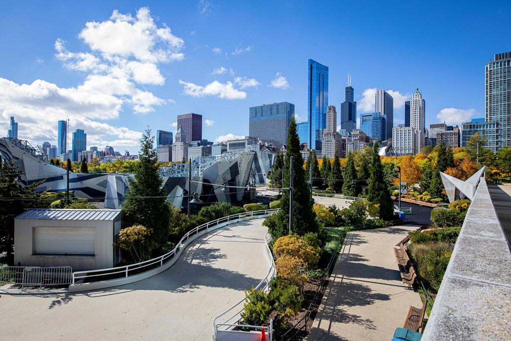 a view of a park with a city in the background at Columbus Plaza, Chicago