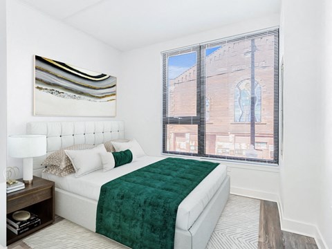 43 Green bedroom with a bed and a large window