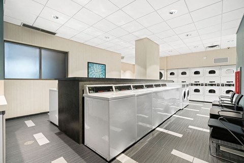 Bright Laundry Room at Elm Street Plaza, Chicago