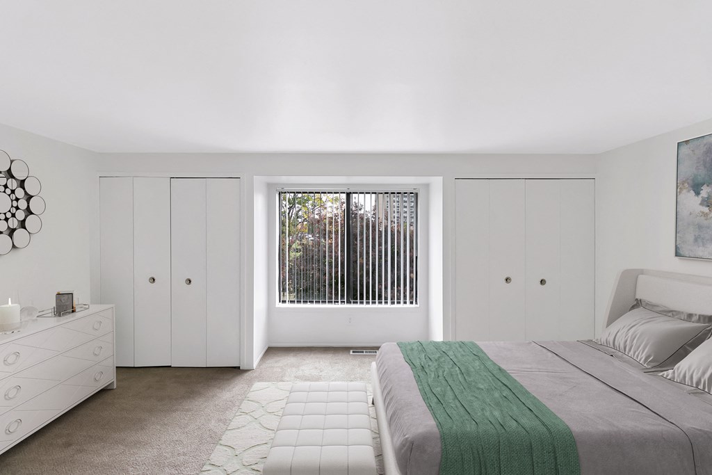 Bedroom With Balcony at The Village of Hyde Park, Michigan