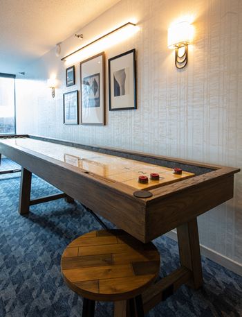 a shuffleboard table in a hotel room
