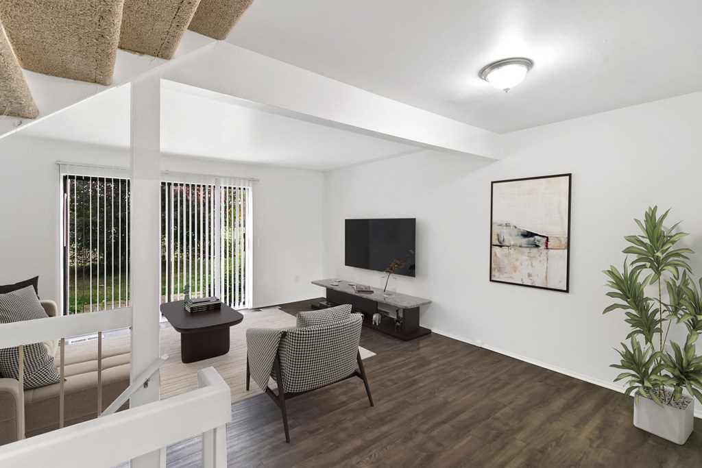 Living Room With TV at The Village of Hyde Park, Detroit, MI