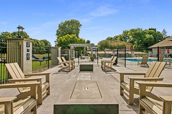 Outdoor courtyard with fire pit at The Waverly, Michigan