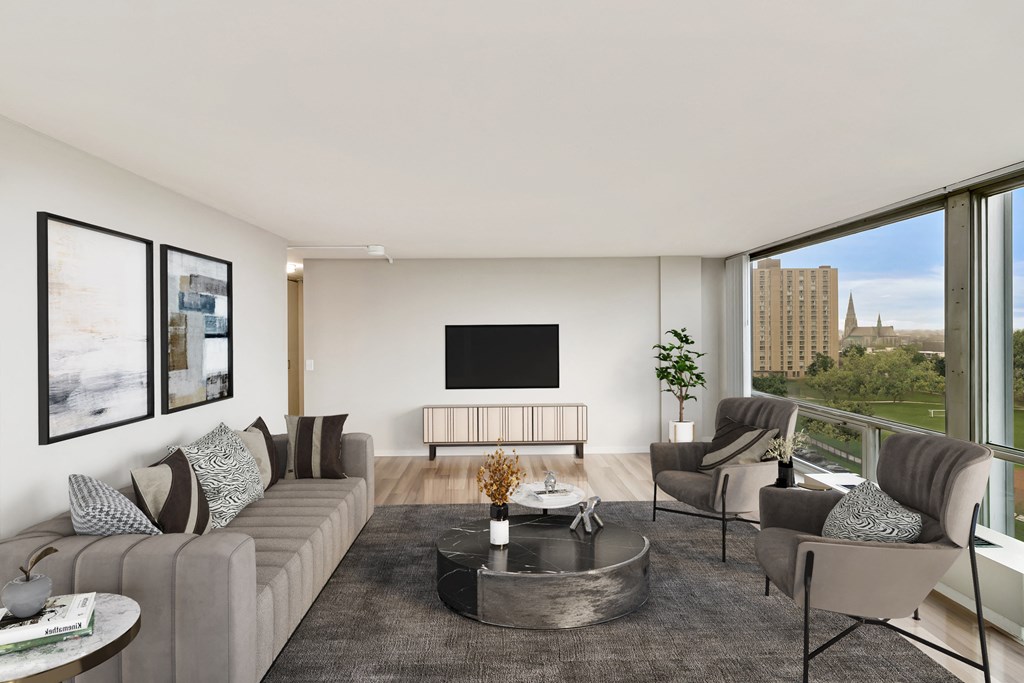a living room filled with furniture and a large window at The Pavilion, Michigan