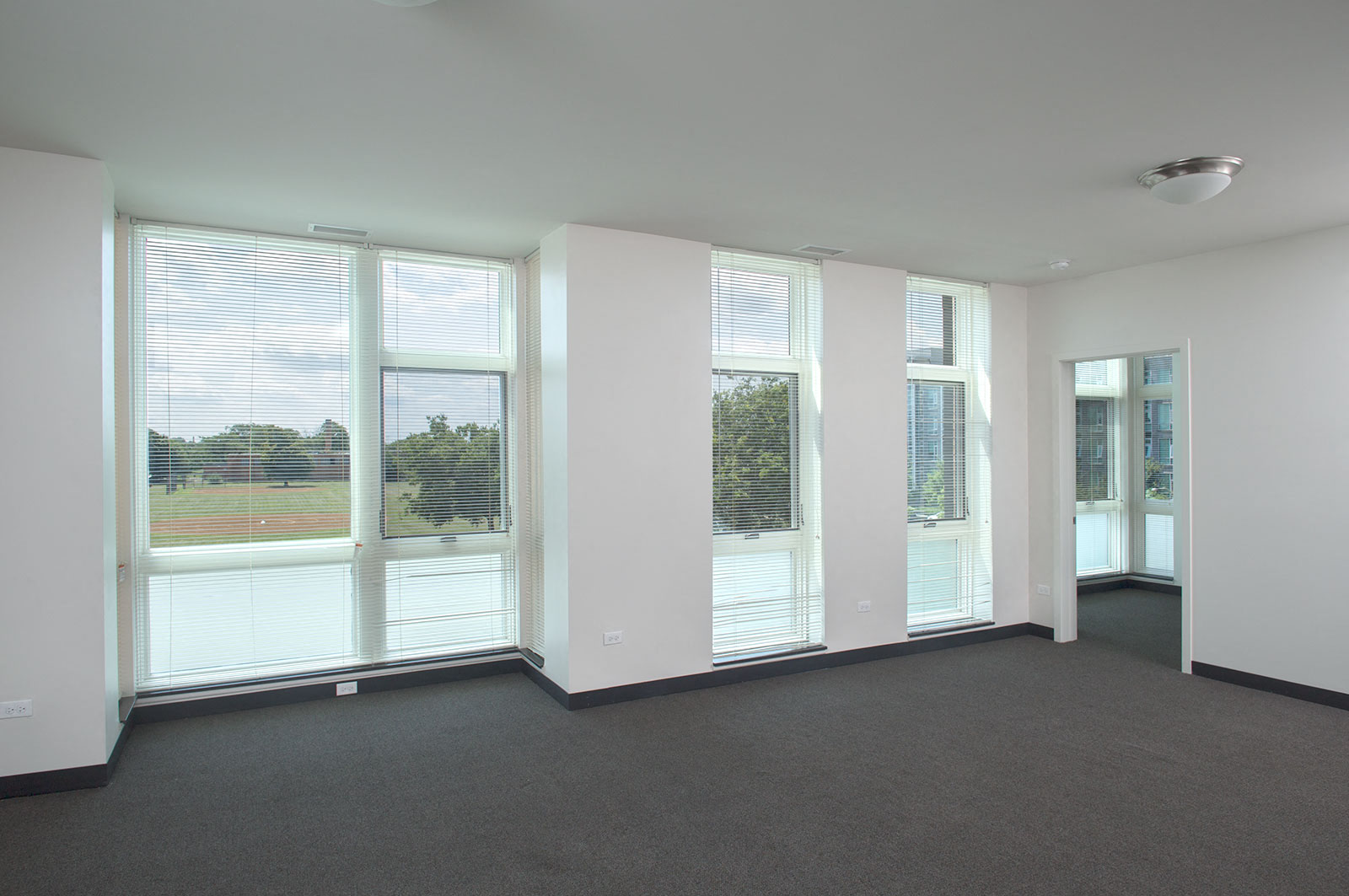 Image of Park Boulevard IIB containing view of living room windows and layout