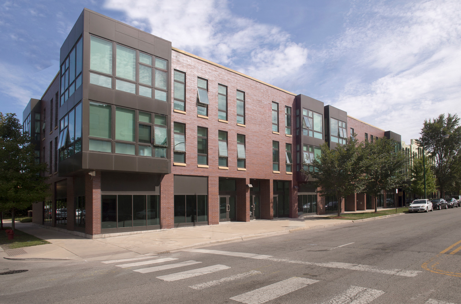 Corner Exterior image of one of the Park Boulevard IIB buildings, plus surrounding neighborhood