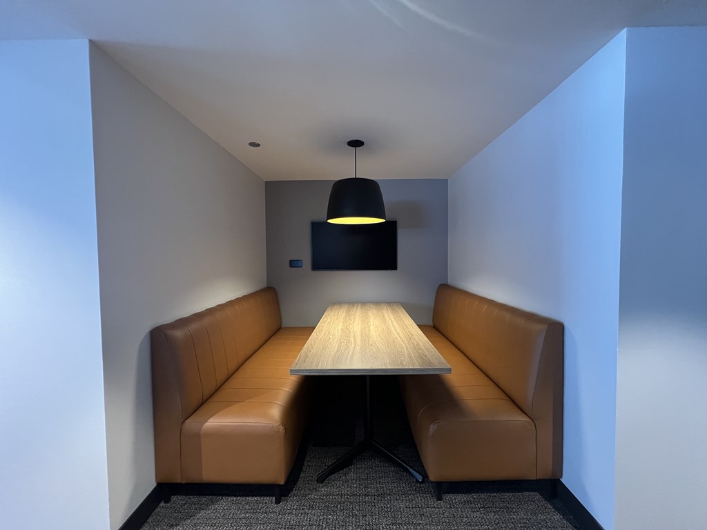 A conference room with a table and two chairs at Kingsbury Plaza, Chicago, IL, 60654