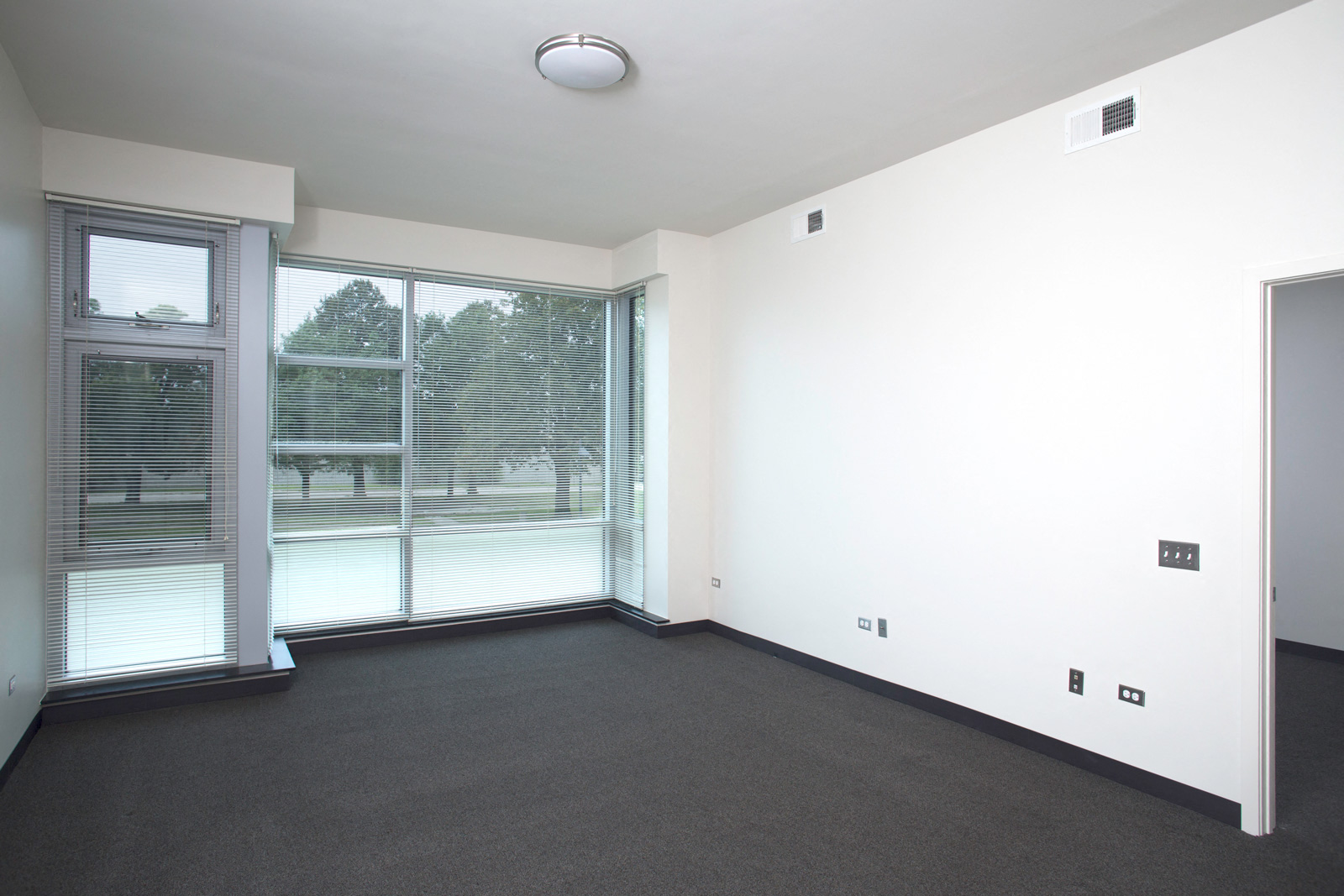 Image of Park Boulevard IIB bedroom layout with view of large windows and their views