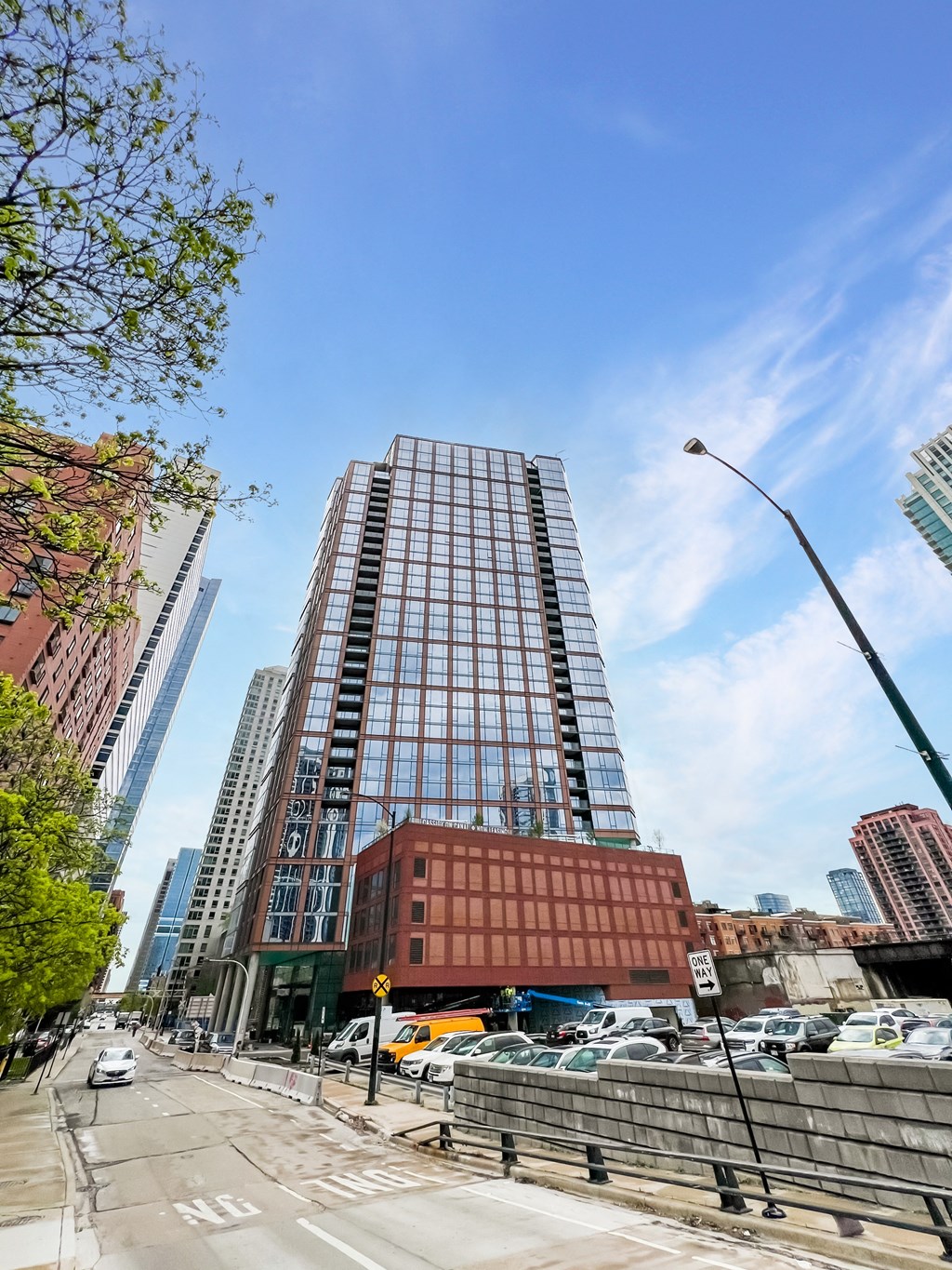 a view of a tall building on a city street  at Cassidy on Canal, IL, 60654