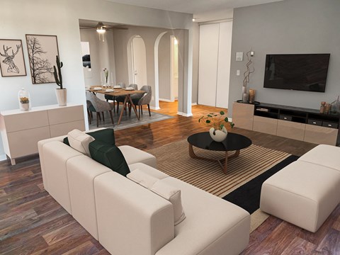 a living room and dining room with white furniture and a television