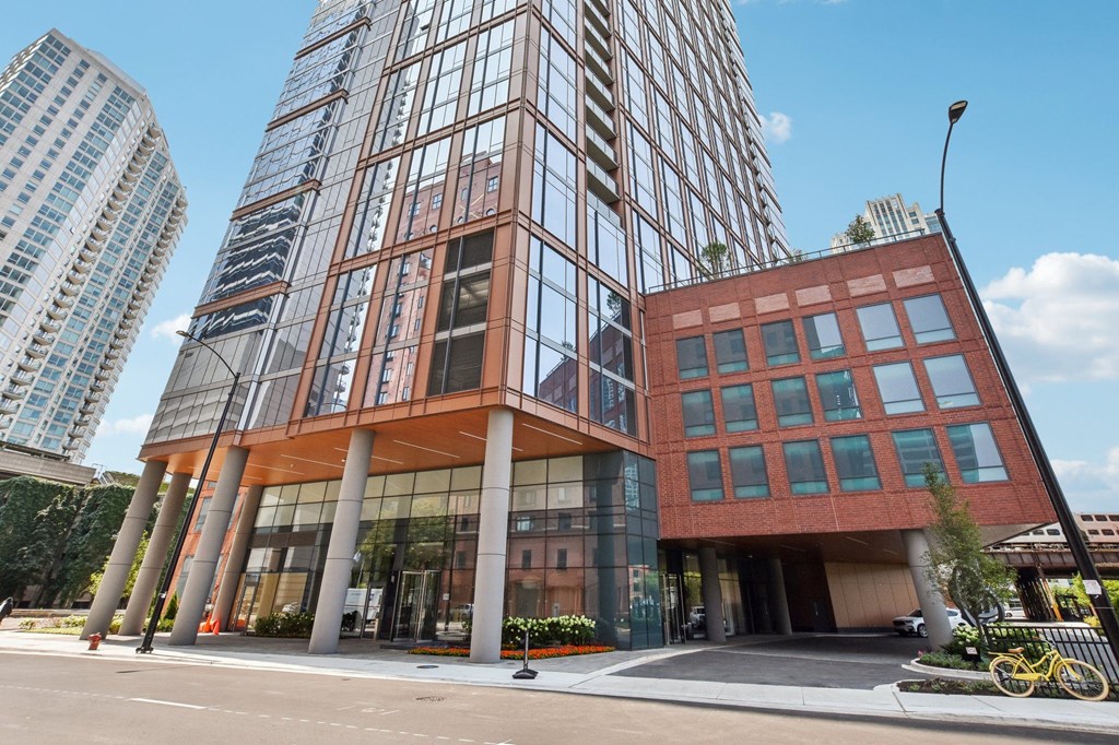 a tall building on the corner of a city street at Cassidy on Canal, Chicago