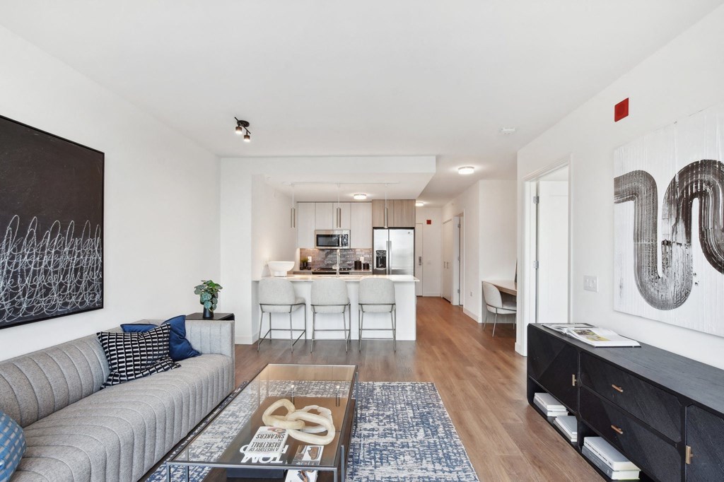 a living room with a couch and a table at Cassidy on Canal, Chicago