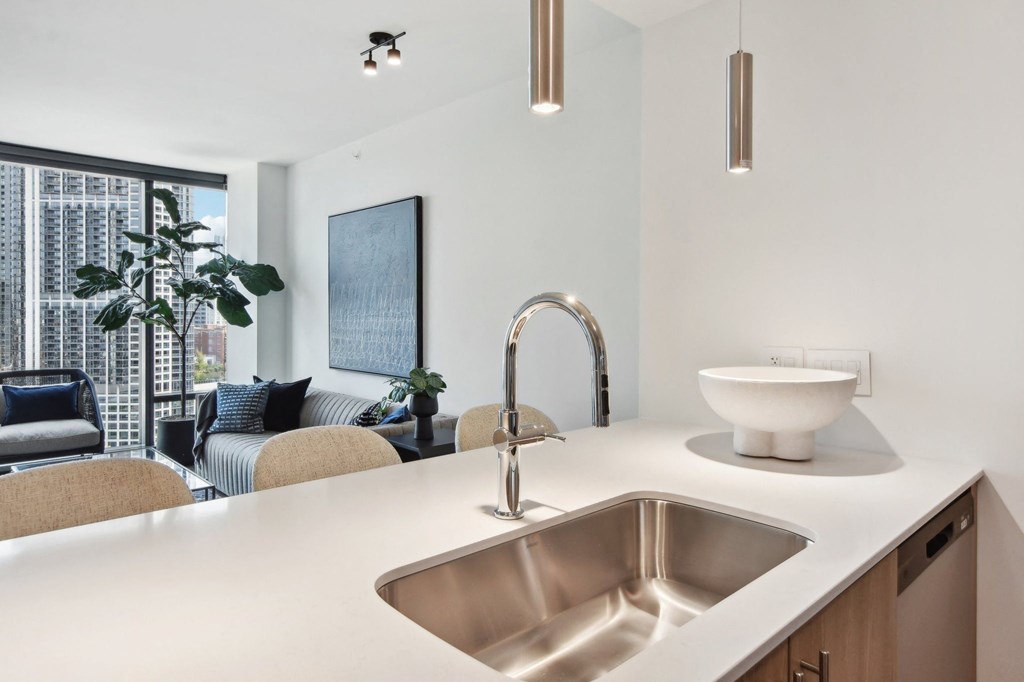 a kitchen with a sink and a window at Cassidy on Canal, Chicago, IL