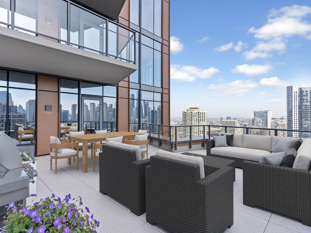 a rendering of a balcony with furniture and views of a city at Cassidy on Canal, Chicago, Illinois