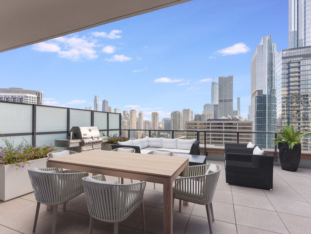 a terrace with a table and chairs overlooking a city at Cassidy on Canal, Chicago, 60606