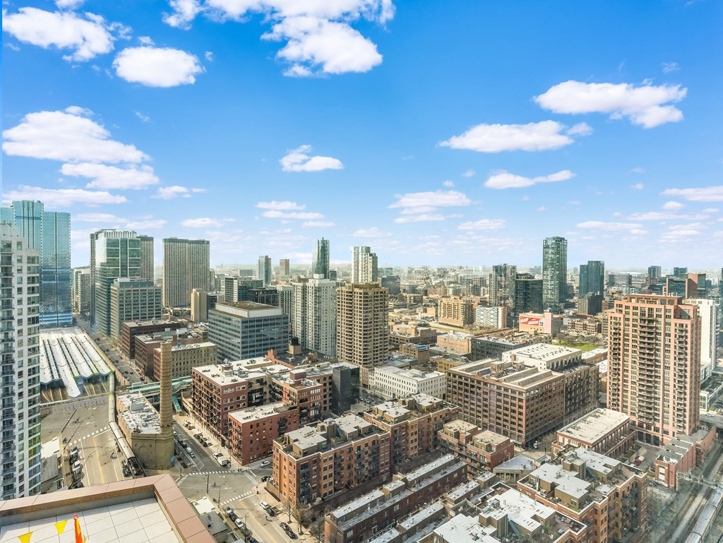 a view of the city from the top of a skyscraper