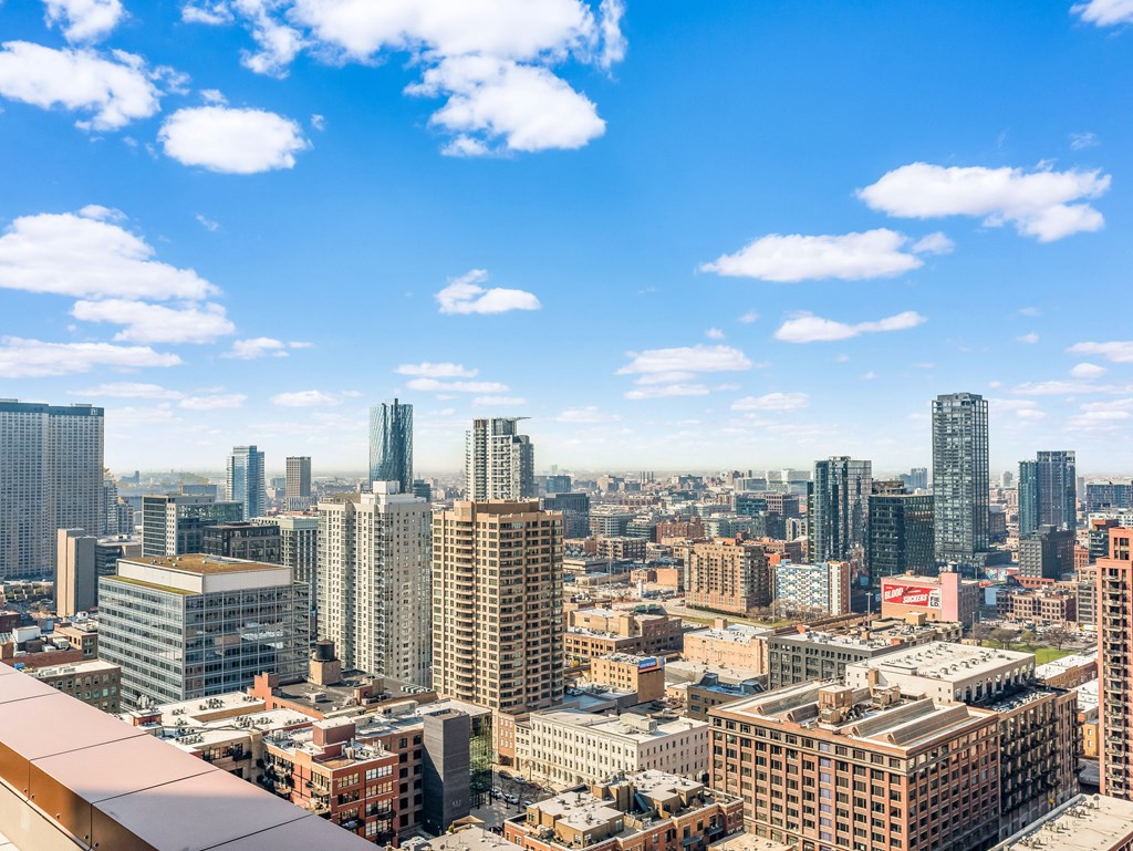 a view of the city from the top of a skyscraper at Cassidy on Canal, Chicago, IL
