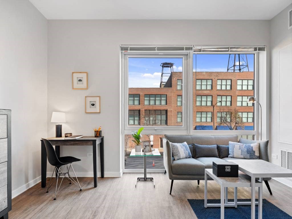 Living Area With Study Table at 23rd Place Apartment, Chicago, IL, 60654
