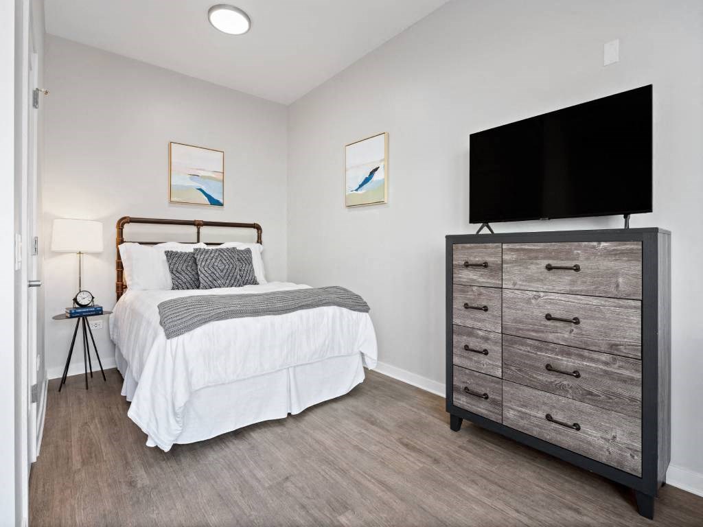 Bedroom With TV at 23rd Place Apartment, Illinois, 60654