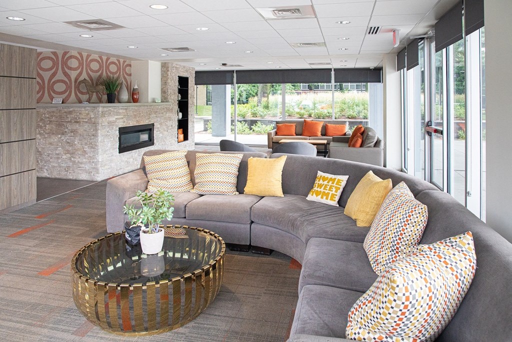 Community lounge area with fireplace at The Pavilion, Michigan, 48207