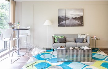 The Pavilion studio apartment with floor to ceiling windows overlooking lush greenery in Detroit - Photo Gallery 2