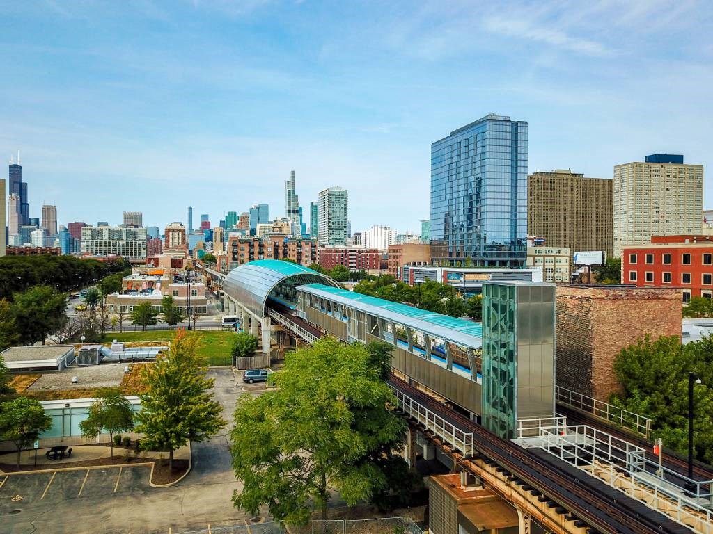A train is on a track in a city.