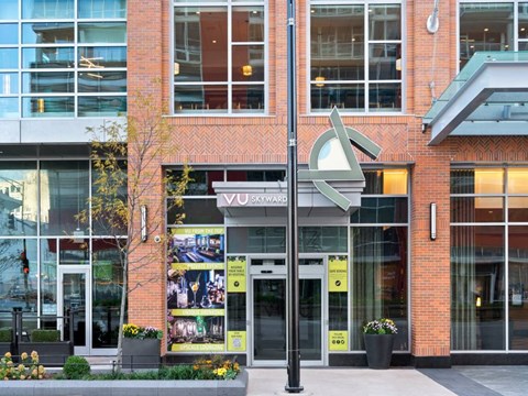 A building with a sign that says "Vox" on it.