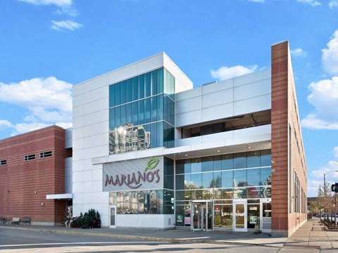 The exterior of a Mariano's store with a clear blue sky in the background.