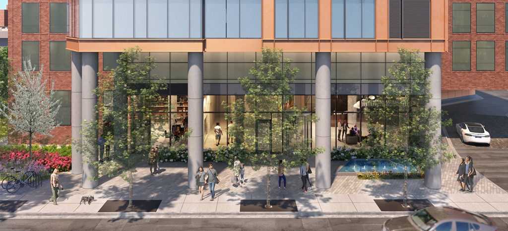 an aerial view of a building with trees and people in front of it  at Cassidy on Canal, Chicago, IL