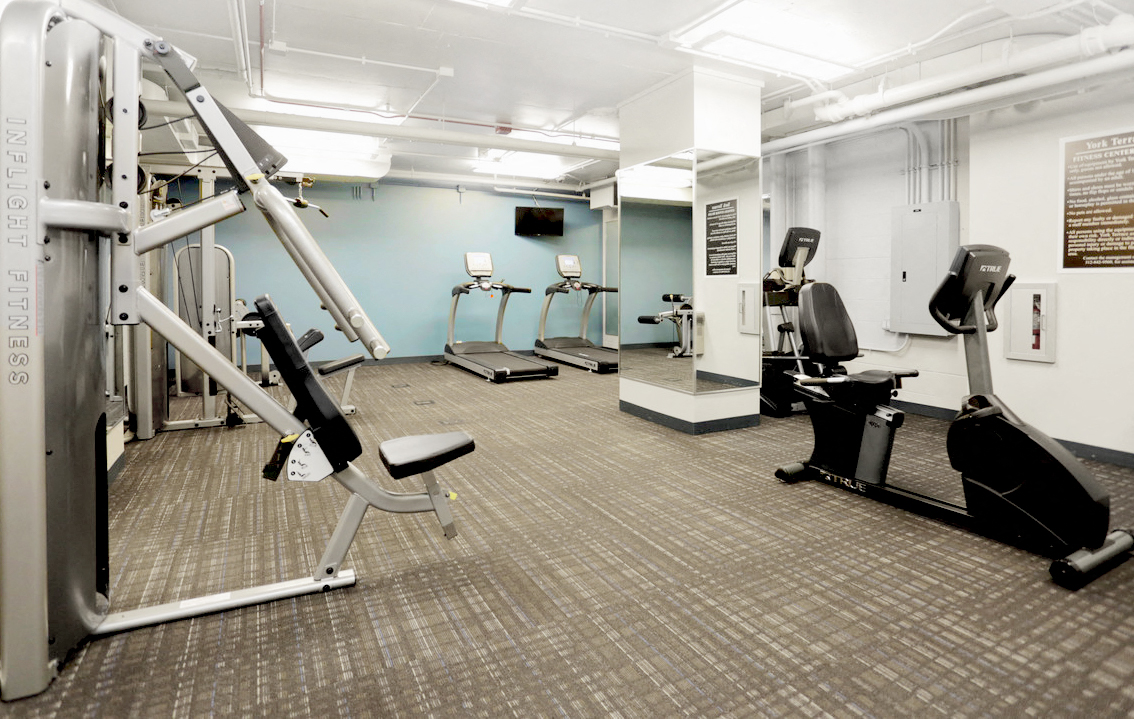 Fitness center with cardio and weight lifting machines at Eden Commons, Chicago, 60616