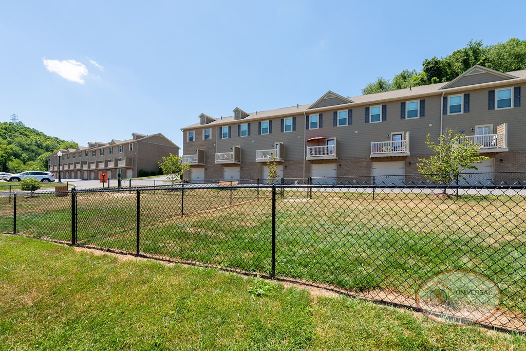 A fenced in dog park.