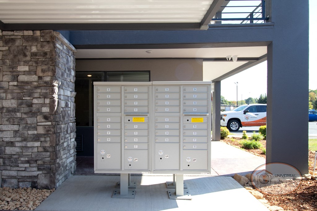 the lockers are outside of the front door of the building