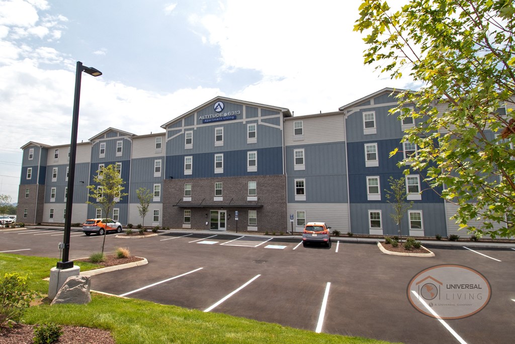 The front exterior of Altitude @ 6313 apartment homes.