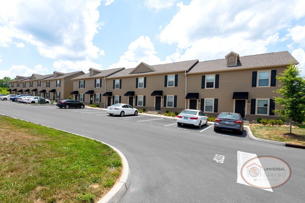 Two bedroom Apartment Homes with tan siding.