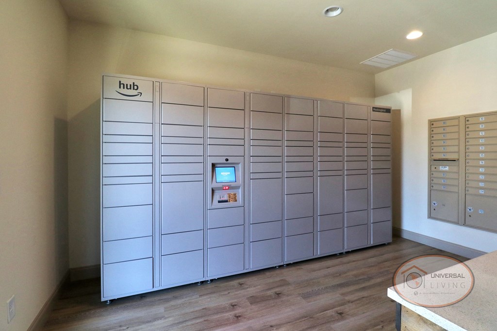 a large set of lockers in a room with a wood floor